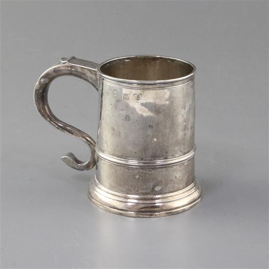 A George I Brittania standard provincial silver mug by John Elston, 5 oz.